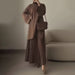 Zweiteiliges Set “Urban Elegance” mit Oversize-Pullover und Plissee-Rock