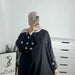Langer Abaya-Kleid mit Gänseblümchen-Stickerei